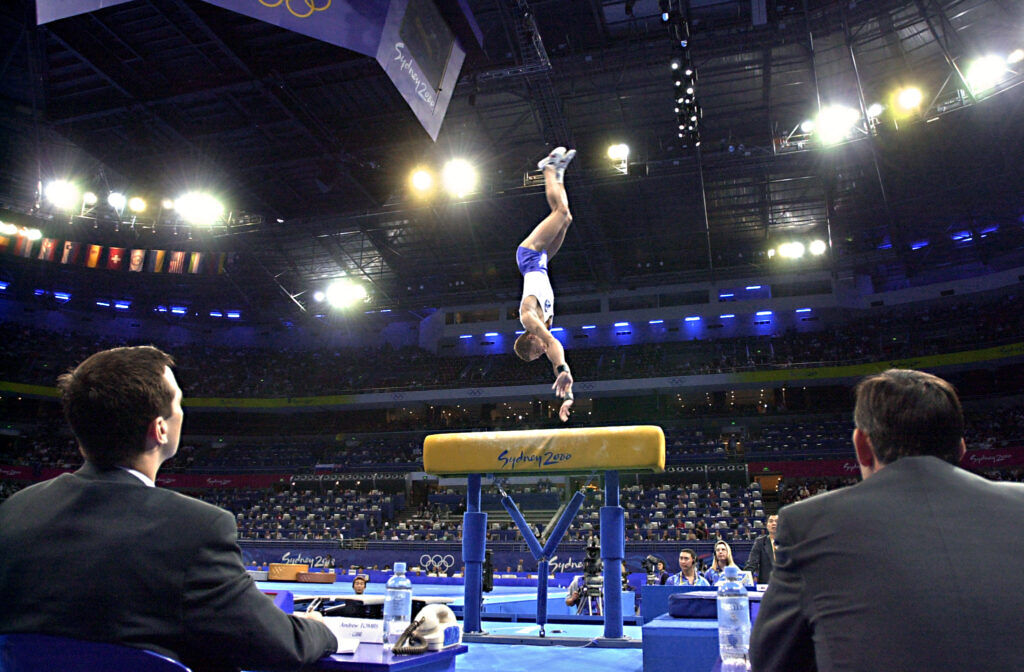 Ioannis Melissanidis of Greece performs his routine on the vault during the men's apparatus finals at the Sydney 2000 Olympic Games.