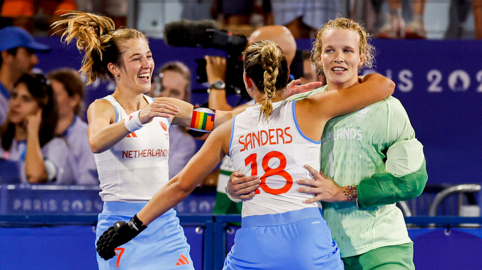 Out gay goalie, with Pride flag on helmet, delivers Olympic hockey gold
