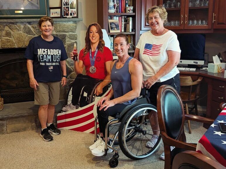 Tatyana McFadden with her parents, Deborah and Bridget