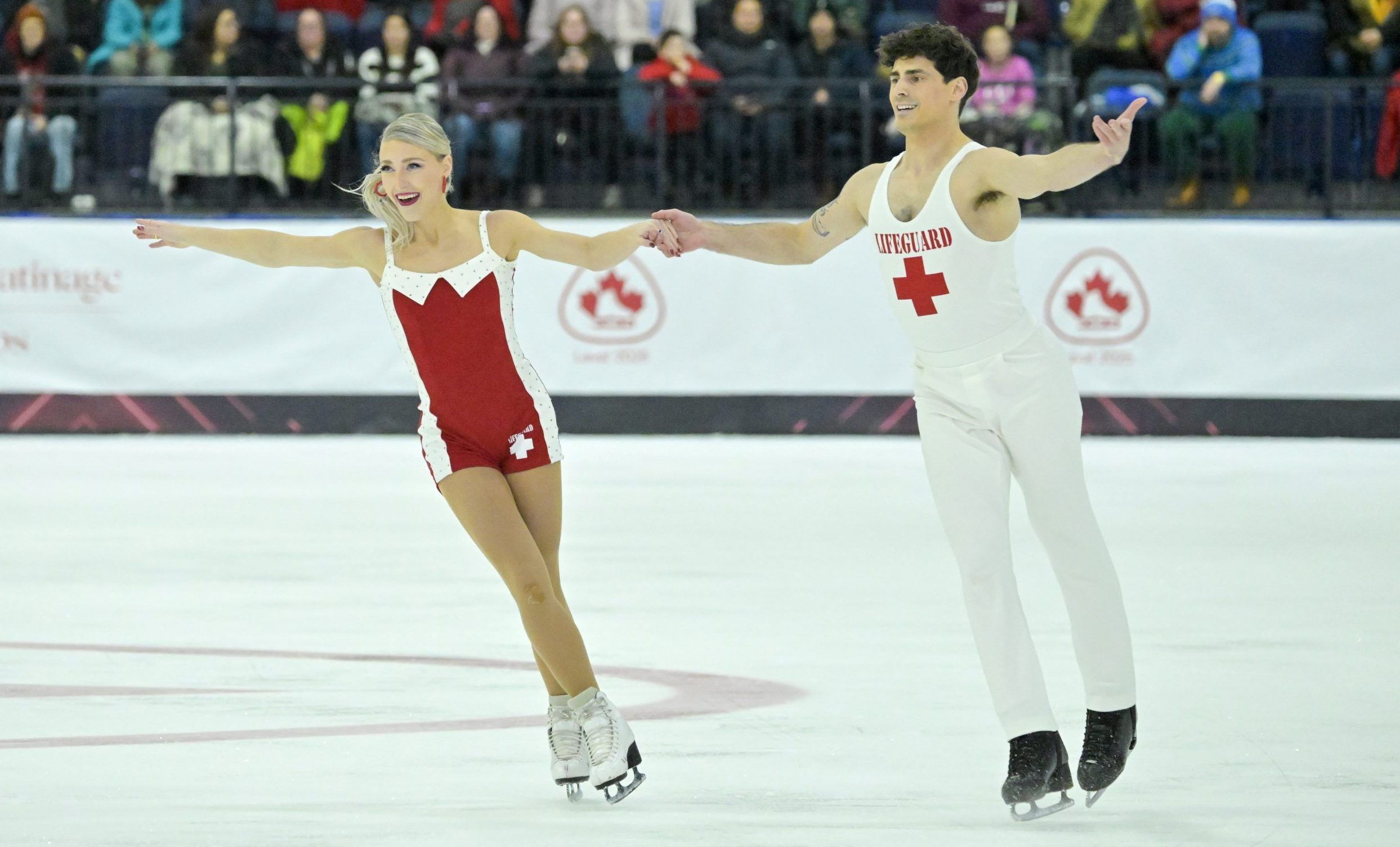 Gay skater Paul Poirier and Piper Gilles win ice dancing gold Outsports